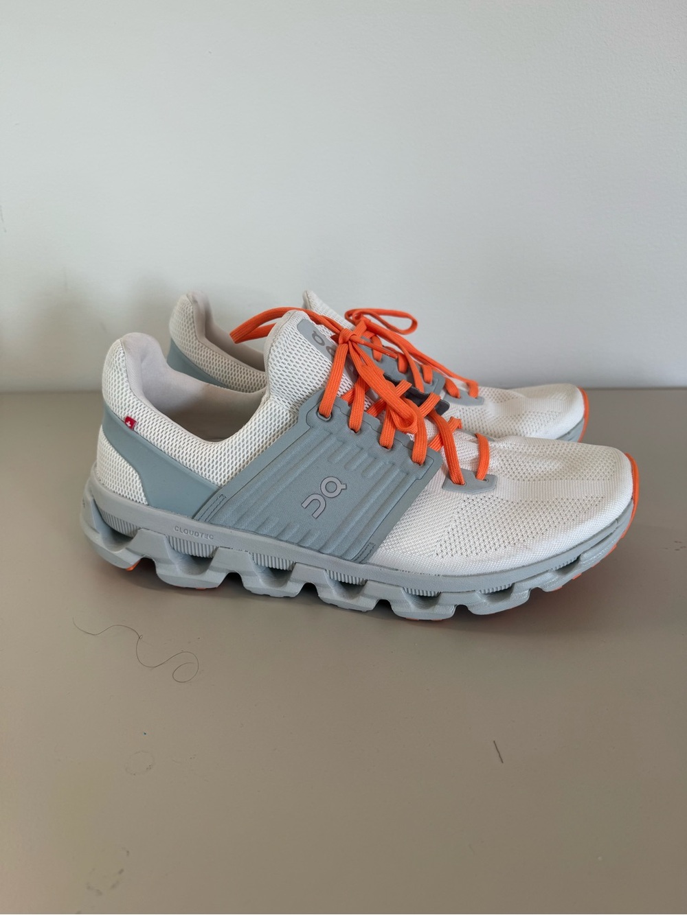 On Running Cloudswift White Sneakers with Orange Accents